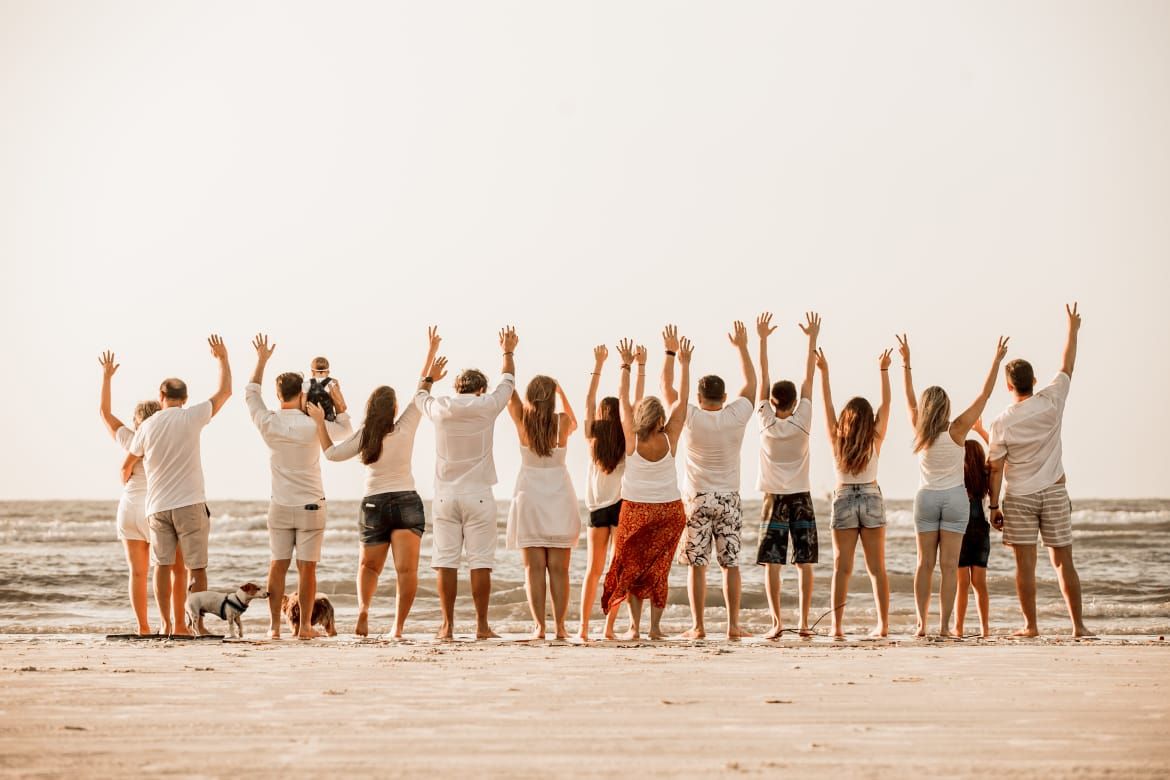 Grupo de viaje TovLov en la playa